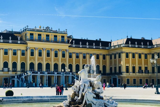 Grand Schoenbrunn Palace and Carriage Museum Tour Small Group - Schönbrunn gardens: Neptune Fountain, Roman ruins, and the Gloriette shot