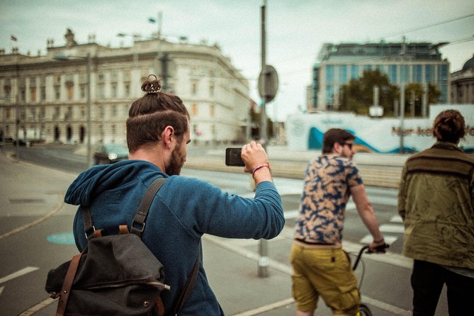 Kick-Bike Small-Group Tour Through Vienna with Locals - Stop 1: Old market street art and the 15th district’s shopping spine