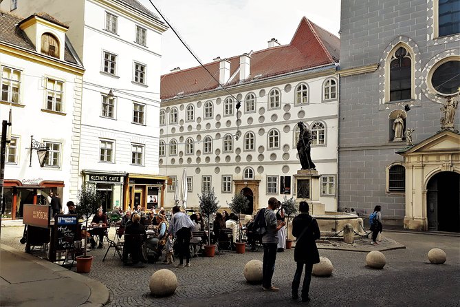 Private Hidden Vienna Walk — Stories Behind Quiet Corners - Schönlaterngasse stories: basilisk mural and the 1905 schnitzel link