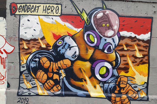 Street Art Tour in Vienna - Stop 4: Friedensbrücke and how overpainting changes the story