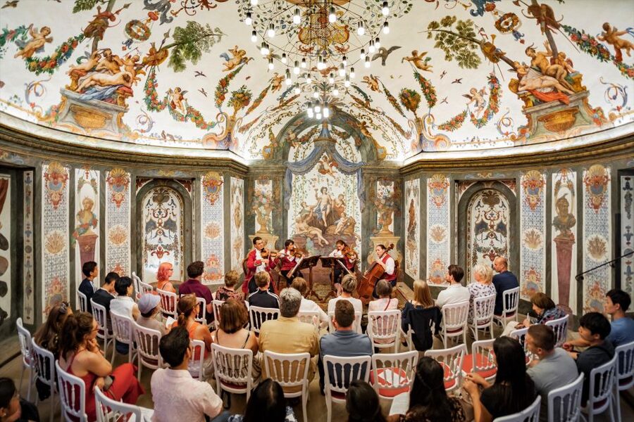 Vienna: Classical Concert at Mozart's First House - The Sala Terrena: frescoes, ornament, and a monastery that dates to the 1100s