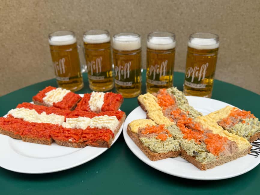 Vienna: Guided Food Tour with 8+ Food Tasting & Secret Dish - Goulash with dumplings and local white wine: the hearty middle that makes the tour feel complete