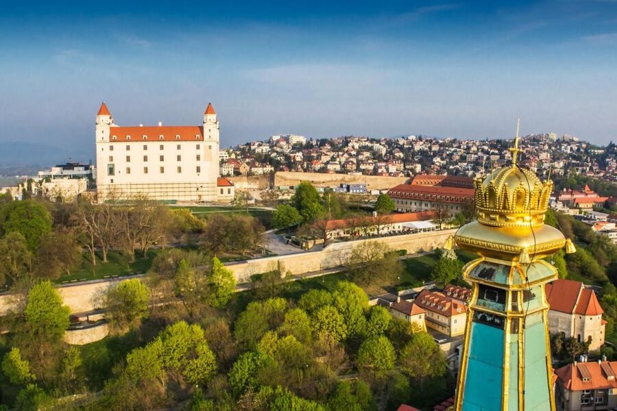 Vienna: Private Day Trip to Bratislava with Hotel Transfers - The guided Old Town walk: Reduta, Primate’s Palace, and the Man at Work ritual