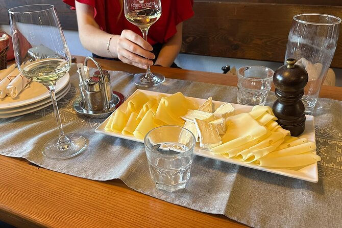 Vienna : Vienna Forest Tour with Underground Lake and Wine Tasting - Gumpoldskirchen wine bar stop: tasting local wines with context