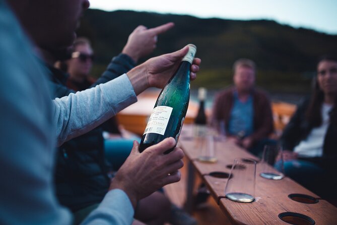 Wine tasting on traditional wooden boats in Wachau Valley - Passing Wachauer Nase and Weissenkirchen: where the tasting story picks up steam